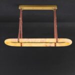 Modern minimalist imitation marble living room chandelier with a retro and luxurious touch exuding a sense of sophistication Designed for a hotel restaurant bar counter featuring a leather belt light